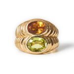 1980s Bulgari 18 karat gold peridot and citrine doppio ring