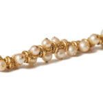 1970s french 18k gold "rope" and pearl necklace.