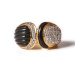 **SOLD** 1980s/1990s 18kt gold onyx and diamond ring.
