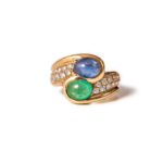 1980s ‘Toi-et-Moi’ Emerald, Sapphire and Diamond 18kt gold ring.